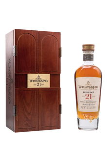 Preet's Liquors WhistlePig The Béhôlden 21 Year Old single malt whiskey bottle with its wooden presentation case.