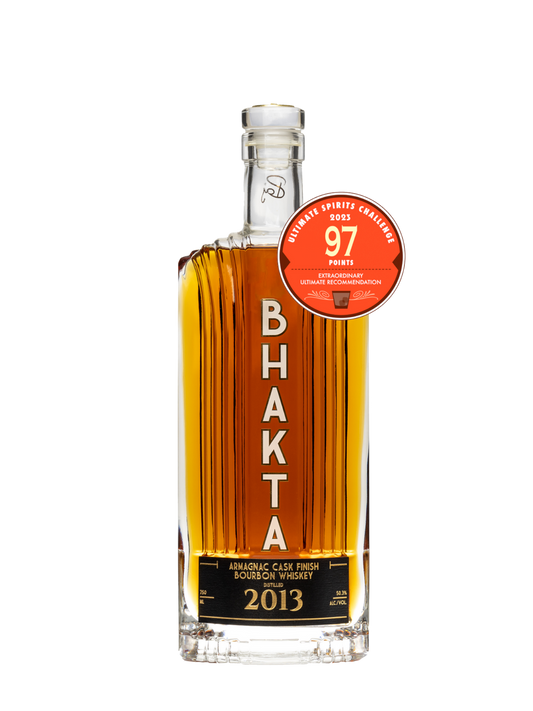 Preet's Liquors Bhakta 2013 Bourbon whiskey in a glass bottle with an Armagnac cask finish and 97 point award seal.
